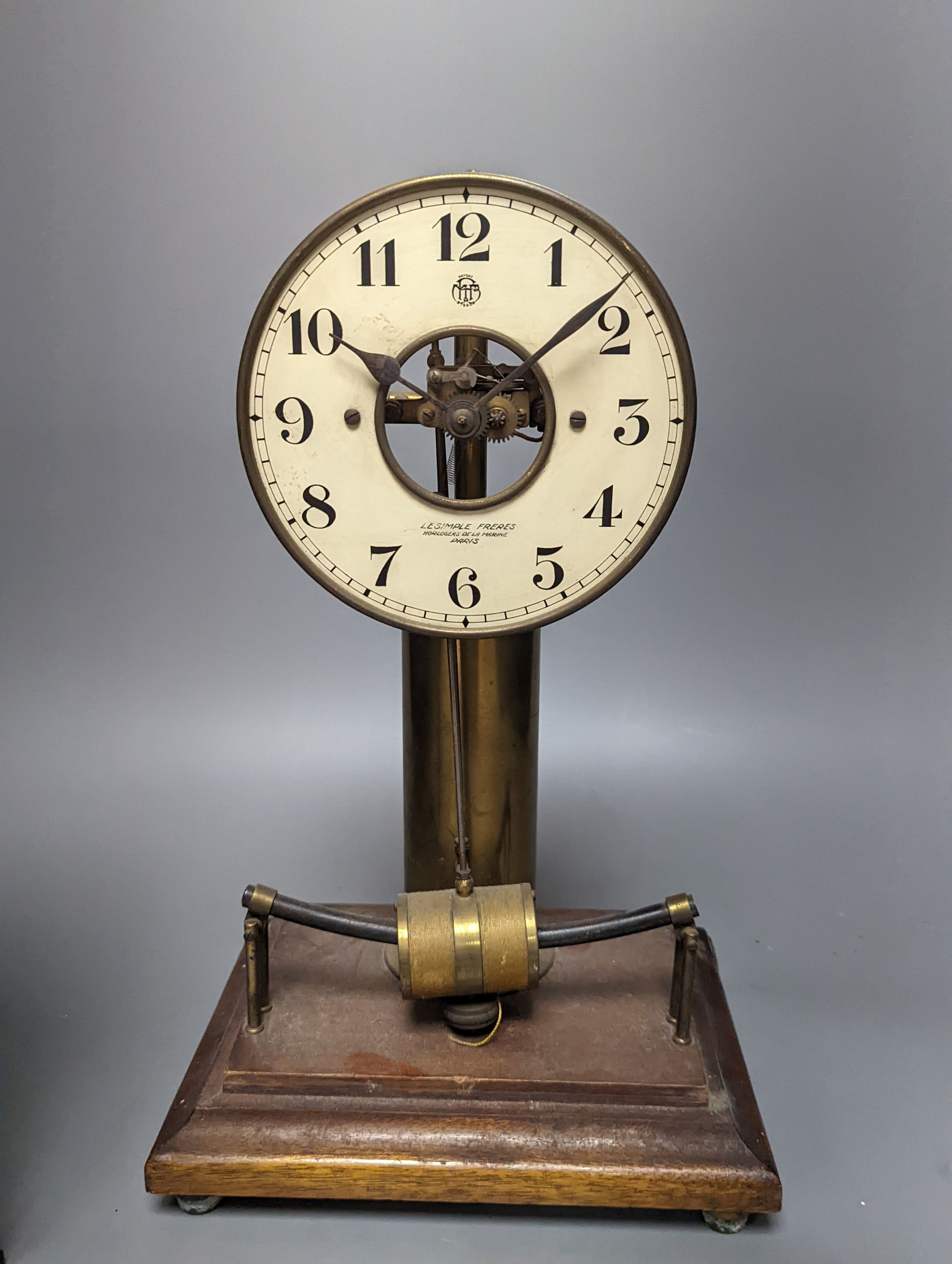 A Maurice Favre - Boulle electric pendulum clock, in a brass and mahogany four glass case, back-glass lacking, H.37.5cm